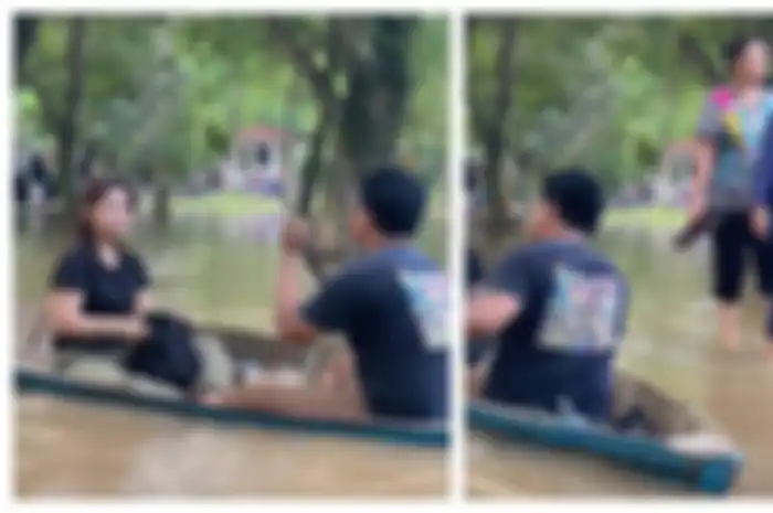 Mome mesra pasangan menerjang banjir yang ketinggiannya hanya semata kaki.
