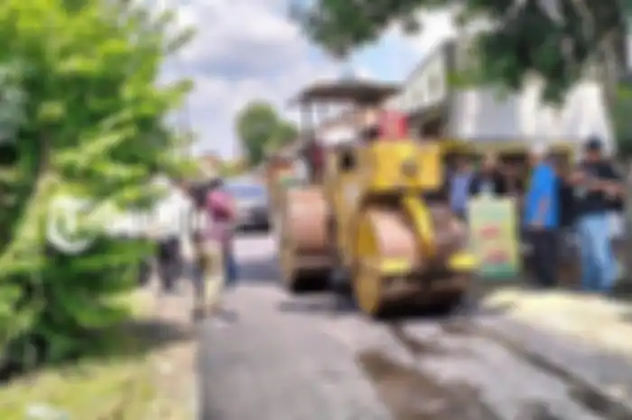 Proses perbaikan Jalan Singopuran, Klodran, Colomadu, Karanganyar.