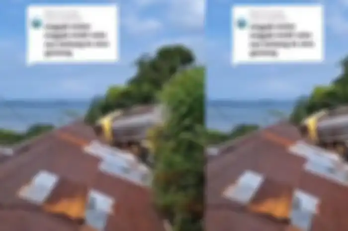 Sebuah truk tangki air nyangsang di atap warga.