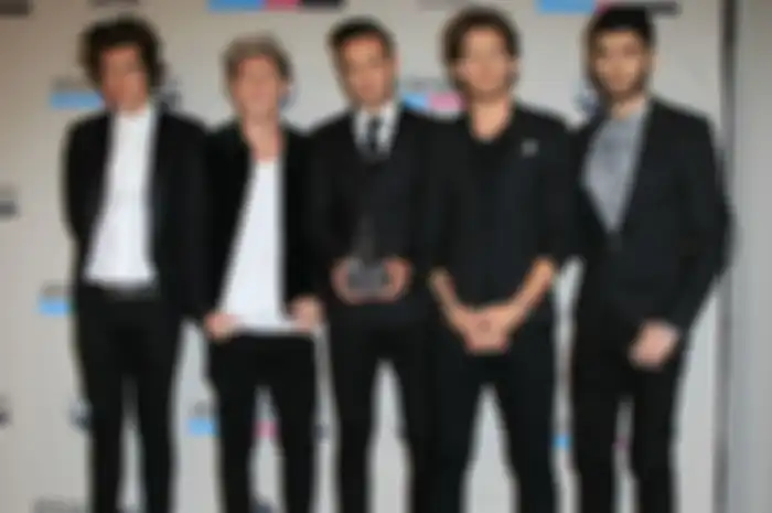 One Direction: Penjualan This Is Us Memecahkan Rekor