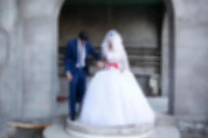 Sepasang pengantin