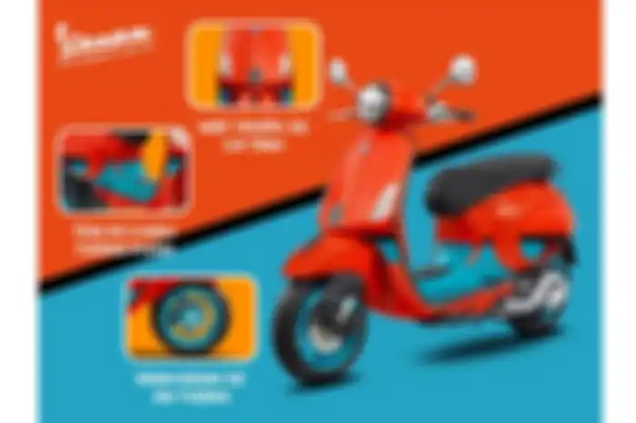 Vespa Primavera Color Vibe dibalut perpaduan warna unik, yakni orange dan biru.