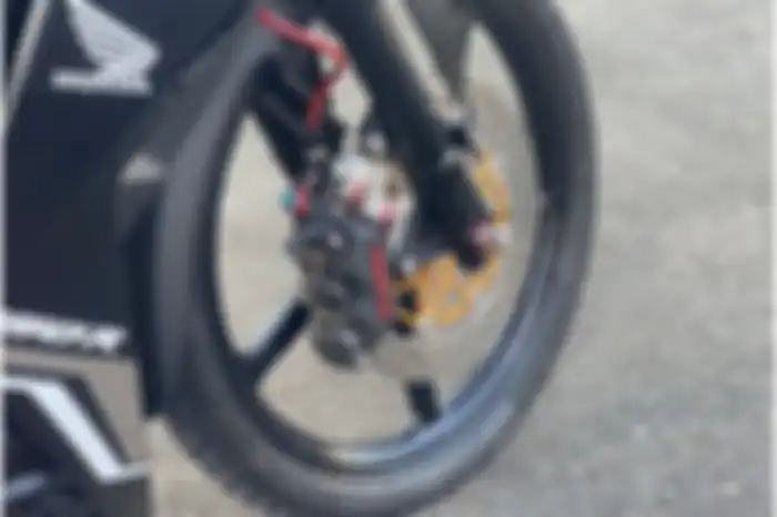 Upgrade pengereman di Honda Supra GTR 150.
