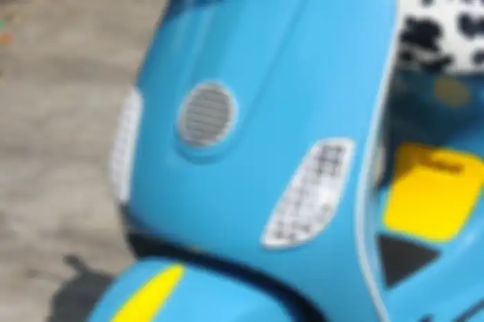 Grill lampu sein Think Scooter.
