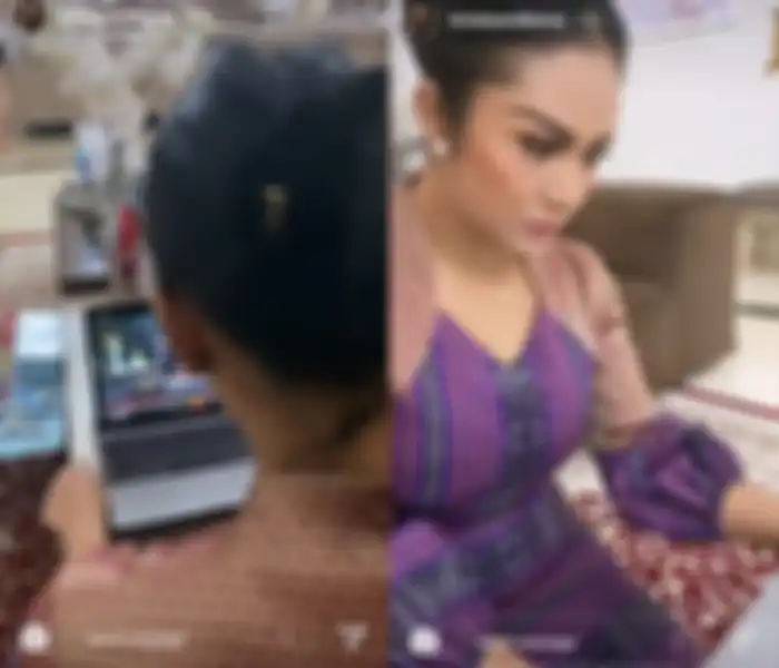 Potret Krisdayanti ikuti rapat paripurna DPR RI secara online dari rumah.