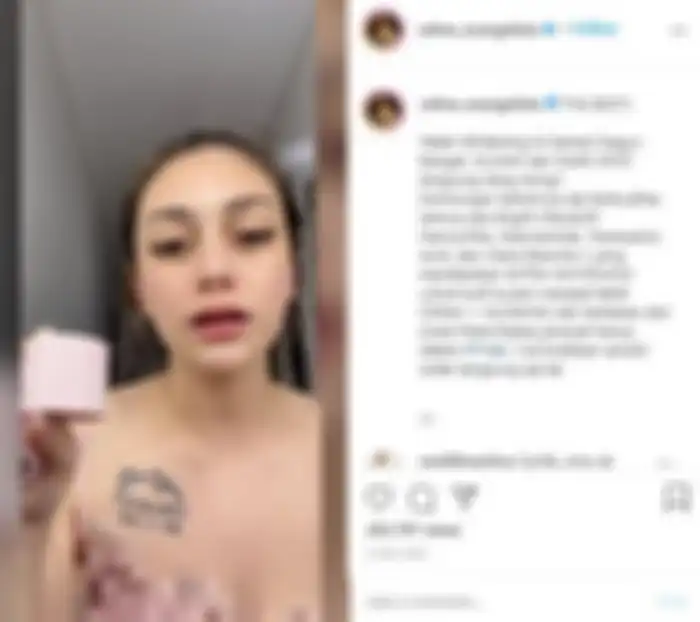 Tato Celine Evangelista di bagian dada