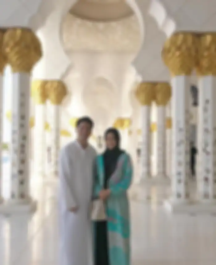 Rini Yulianti dan Suami