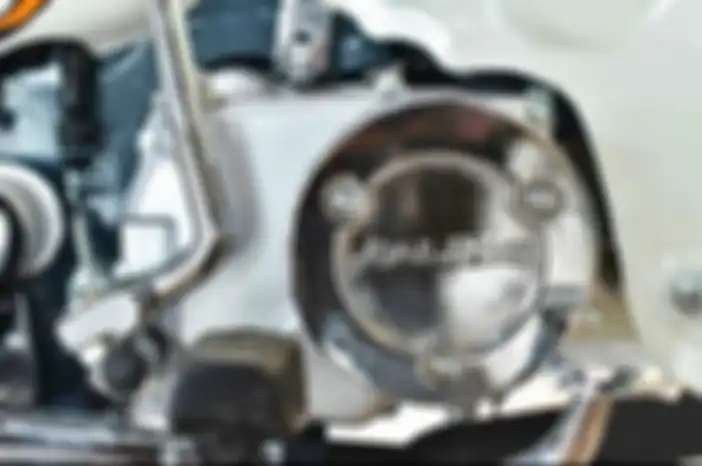 Mesin single silinder 125 cc berpendingin udara di Jialing Coco.