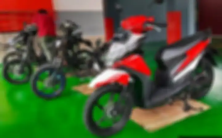 Ilustrasi. Subsidi Rp 7 juta dari pemerintah untuk konversi motor listrik bisa cair asal begini tahapannya.