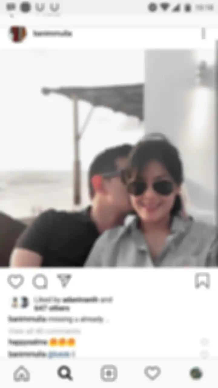 Foto Lulu Tobing tampil mesra dengan seorang pria.