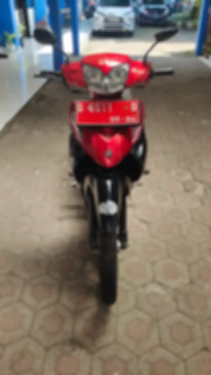 Terlihat dari depan Suzuki Shogun 125 ini masih mulus