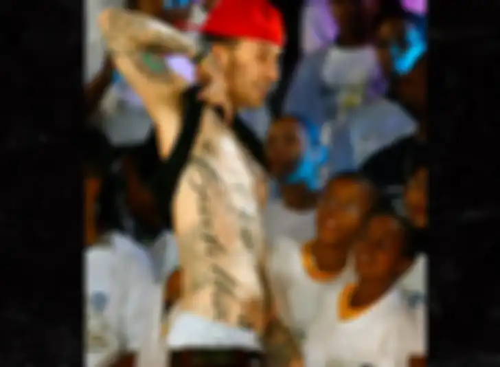 Travis dan tato Cadillac-nya