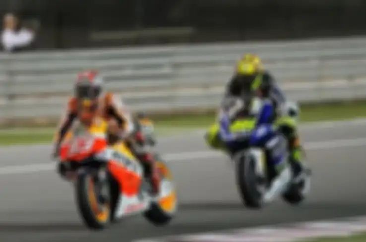 Marc Marquez melawan Valentino Rossi di MotoGP Qatar 2013, balapan debut Marc Marquez di MotoGP. 