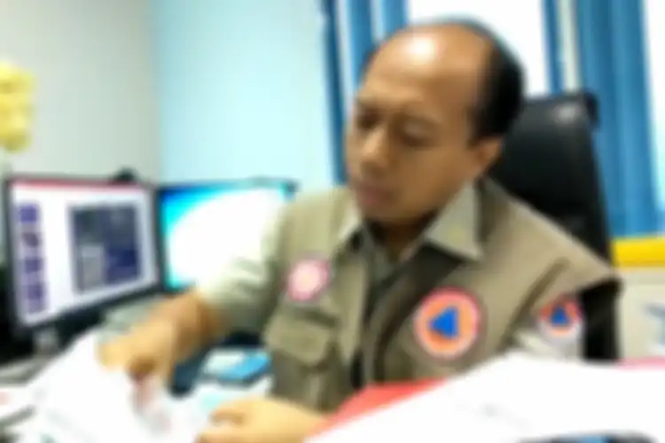 Sutopo Purwo Nugroho di ruang kerjanya di Badan Nasional Penanggulangan Bencana (BNPB), Kamis (4/10/2018)