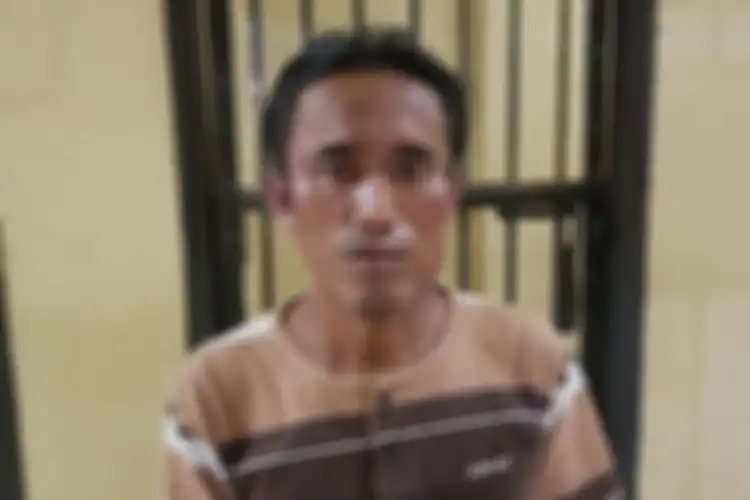 Muhammad  diamankan karena menyetubuhi anak kandungnya hingga melahirkan. (Foto: Kompas.com/A. Faisol)