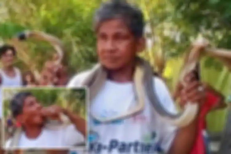 Bernardo Alvarez (62 tahun), menangkap Kobra Filipina Utara yang mematikan di kota Mangaldan, provinsi Pangasinan pada 9 Juli, beberapa saat sebelum kematiannya