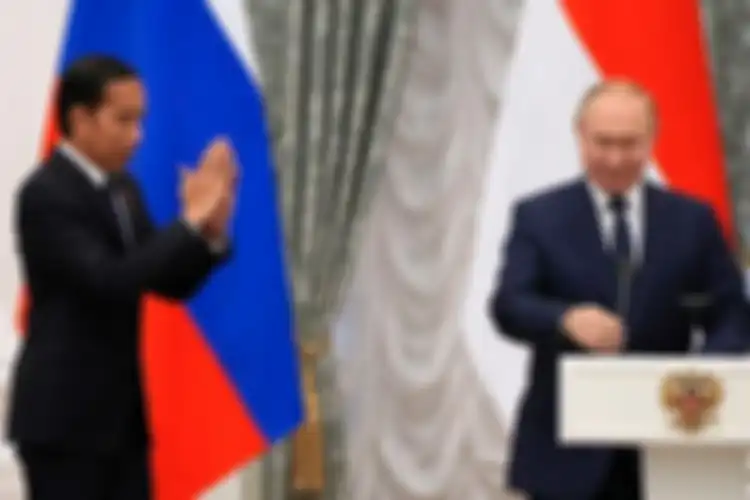 Potret Presiden Jokowi dan Vladimir Putin.