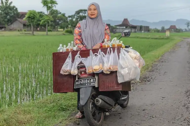 Penjual Jamu Naik Yamaha Mio Mendunia, Bersanding Dengan Taylor Swift
