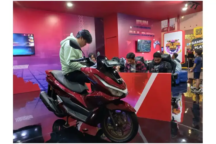 Booth AHM Hadirkan Inovasi Teknologi dan Hiburan Interaktif di IGF 2024
