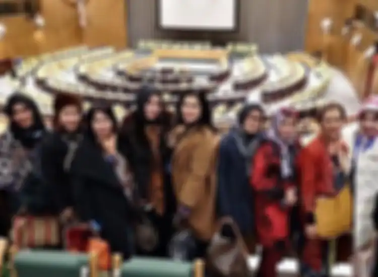 Umi Kalsum saat menghadiri konferensi internasional di gedung PBB