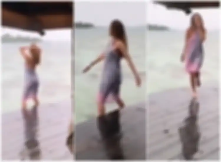 Aksi Luna Maya berjoged di tepi pantai