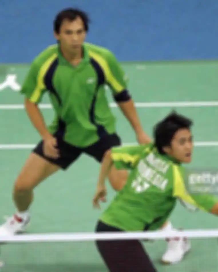 Flandy Limpele saat berpasangan dengan Vita Marissa. Peraih medali perunggu Olimpiade Athena 2004  ini sukses bikin wajah the Minions lesu.