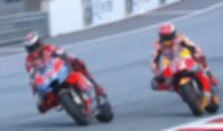 Jorge Lorenzo dan Marc Marquez saat berduel di MotoGP Austria.