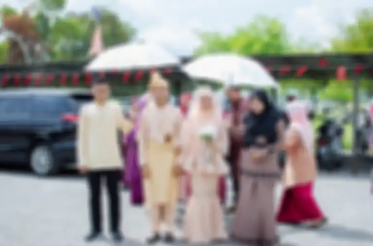 Luqman Afifi beserta istrinya. 