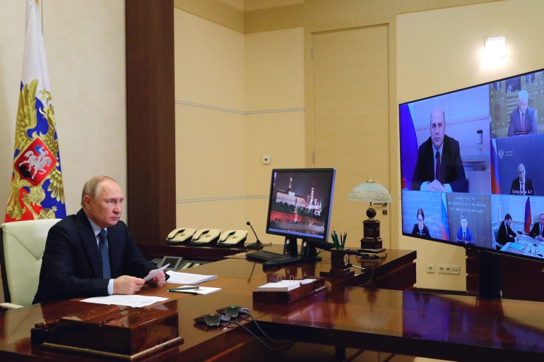 Vladimir Putin saat berpidato di hadapan pejabat tinggi ekonomi Rusia