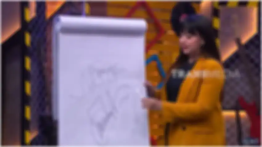 Bentuk tanda tangan Meggy Wulandari dan Kiwil yang diterawang ahli tarot internasional, Mama Ella.