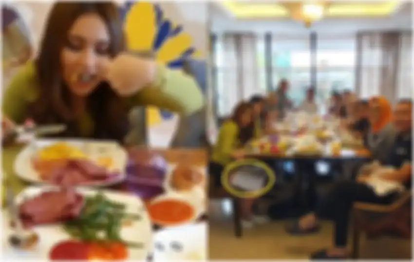 Penampilan Ayu Ting Ting saat makan banjir hujatan