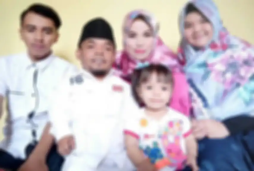 Ucok Baba bersama istri dan anaknya 