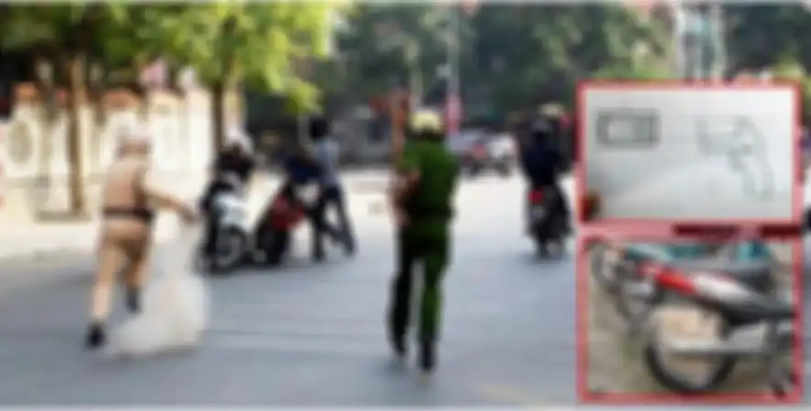 Polisi Vietnam menggunakan jala untuk menangkap pebalap liar.