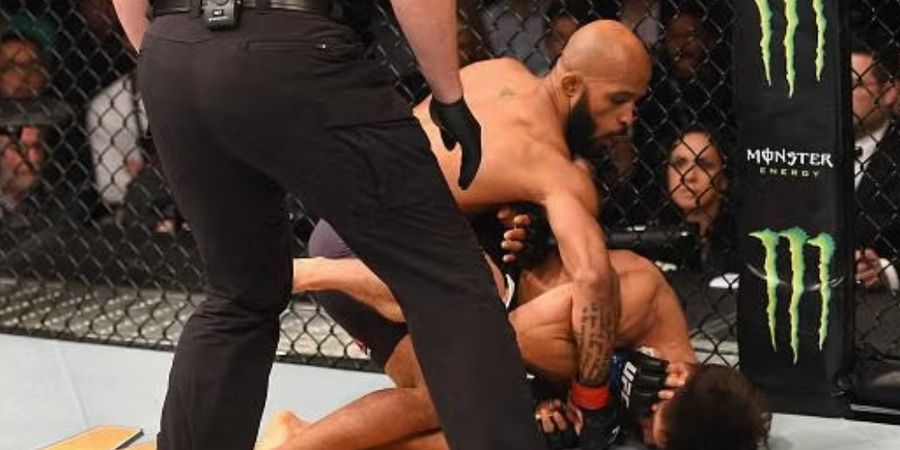 SEJARAH HARI INI - Duel Pertama Demetrious Johnson Vs Henry Cejudo di UFC, Tikus Perkasa Lumat Juara Olimpiade Tak Terkalahkan
