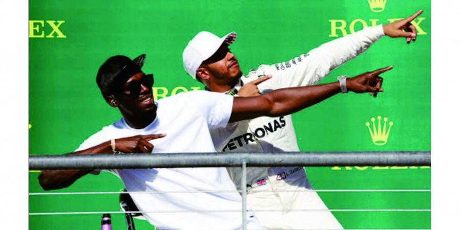 Ini Gaya Usain Bolt Saat Memberi Selamat kepada Lewis Hamilton