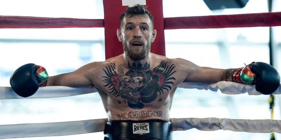 Terpopuler Olimpik - Kondisi Wajah Conor McGregor Usai Kalah dari Floyd Mayweather, Cedara Cal Crutchlow, dan 5 Helm Spesial Valentino Rossi di Sirkuit Misano