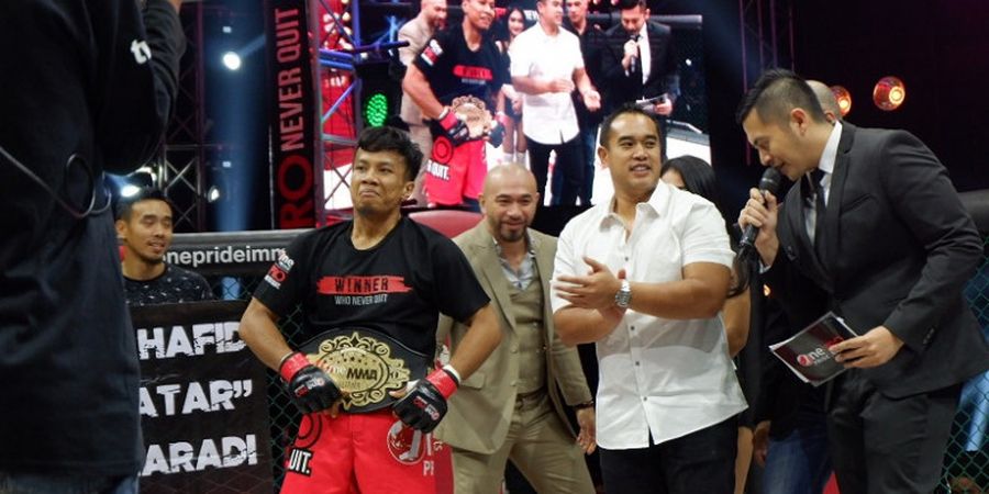 Berita One Pride MMA - Hafid Nur Maradi Raih Sabuk Kelas Bulu