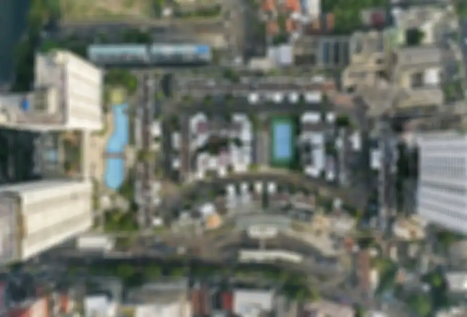 Foto aerial suasana perumahan yang berada di atas mal Thamrin City, Jakarta, Rabu (26/6/2019). Keberadaan perumahan bernama Cosmo Park di atas pusat perbelanjaan Thamrin City ini menjadi bahan perbincangan warganet sejak Selasa kemarin setelah fotonya tersebar di media sosial, terdiri dari lima blok yaitu A1-A19, B1-B12, C1-C19, D1-D16, E1-E15, dan F1-F9.