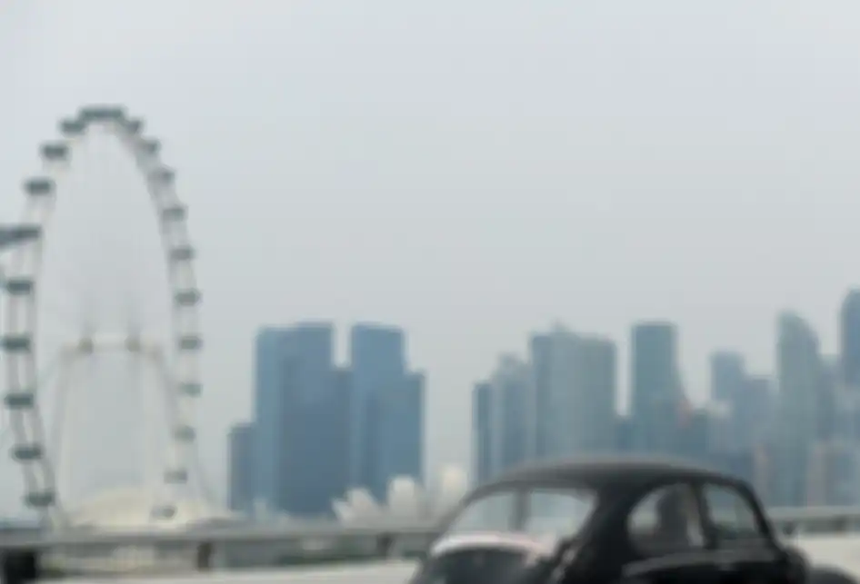 Kondisi wilayah di Singapura yang diselimuti kabut asap, Minggu (15/9/2019). Kabut asap dari kebakaran hutan dan lahan di Indonesia berimbas hingga ke Singapura dan membuat kualitas udara negara tersebut mencapai tingkat yang tidak sehat untuk pertama kalinya dalam tiga tahun terakhir.