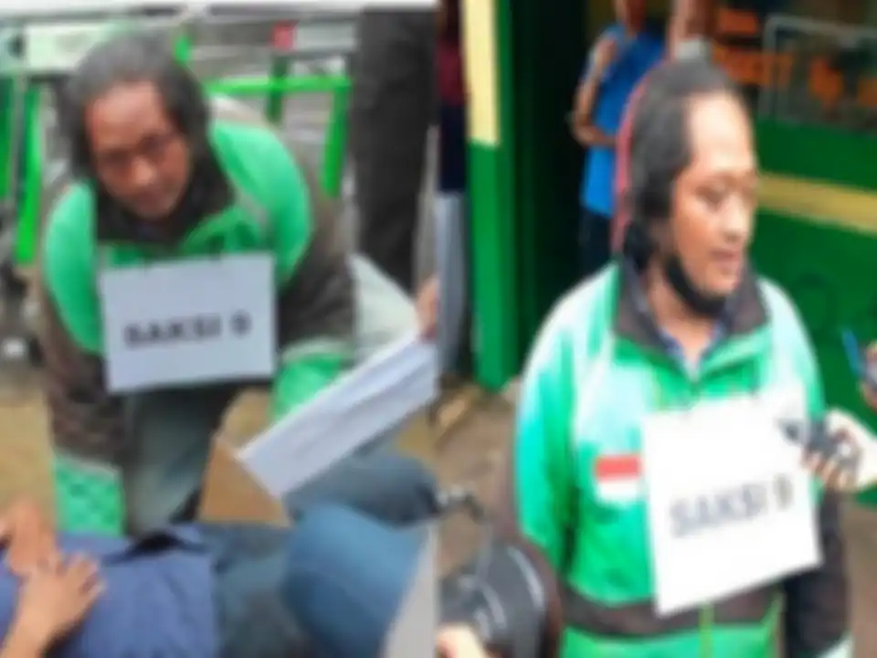 Saksi ke sembilan dalam kecelakaan mahasiswa UI, yaitu seorang driver ojol.