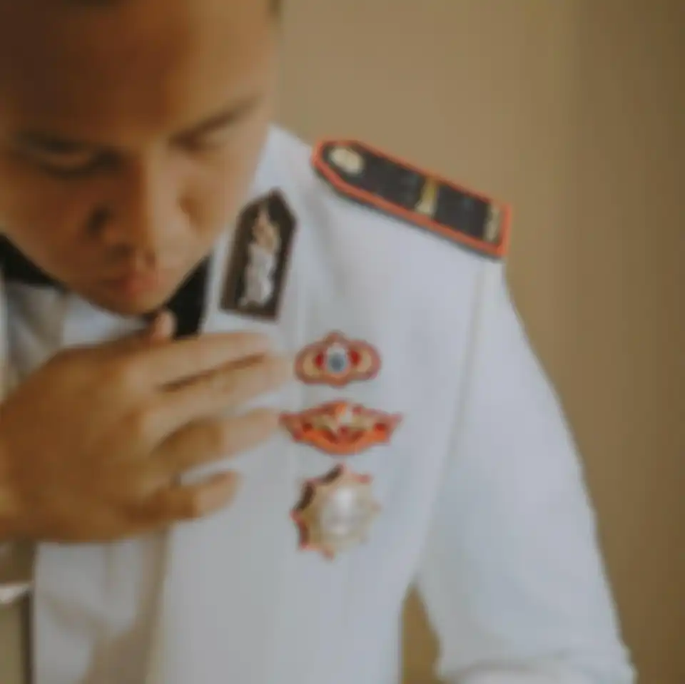 Iptu Danny Arief Sutarman perwira polisi yang sikat ambulans terbos one way di Puncak adalah anak mantan Kapolri. Foto wajahnya disorot.