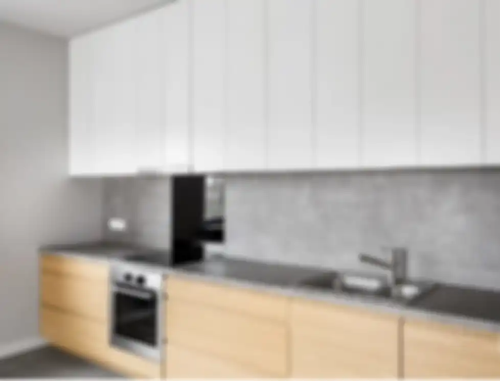 Dekorasi warna abu-abu yang diberi sentuhan begini mampu menghadirkan foto desain dapur mungil dengan tampilan elegan.