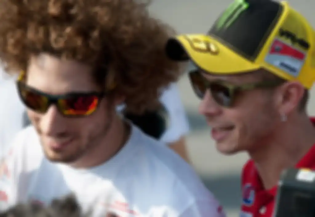 Mendiang Marco Simoncelli dan Valentino Rossi