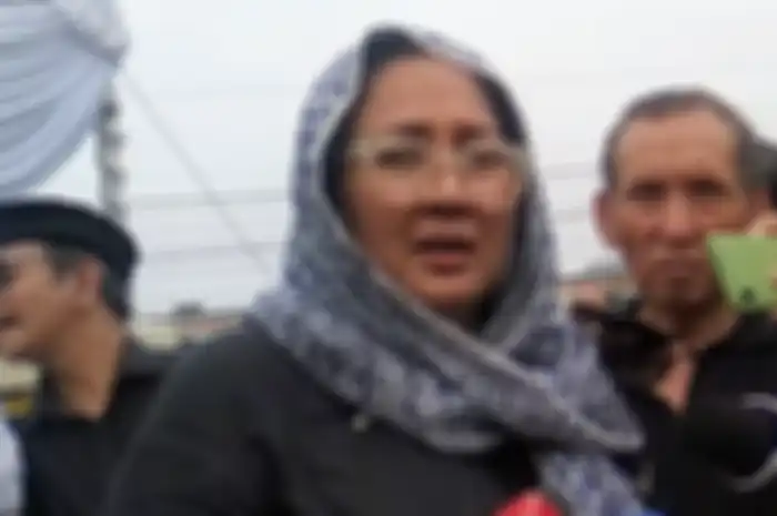 Dewi Irawan di TPU Tanah Kusir, Jakarta Selatan, Sabtu (18/1/2020).