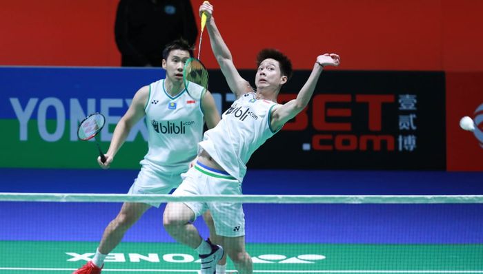 Pasangan ganda putra Indonesia, Marcus Fernaldi Gideon/Kevin Sanjaya Sukamuljo, pada perempat final All England Open 2020 di Arena Birmingham, Inggris, Jumat (13/3/2020).