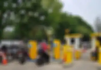 Mau ke Pameran Motor di IMOS Senayan Naik Motor? Tukang Parkir Tolak Uang Tunai