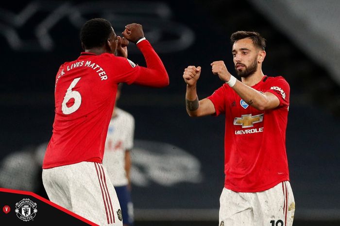 Duet Bruno Fernandes dan Paul Pogba dalam laga pekan ke-30 Liga Inggris antara Tottenham Hotspur melawan Manchester United di Tottenham Hotspur Stadium, Sabtu (20/6/2020) dini bari WIB.