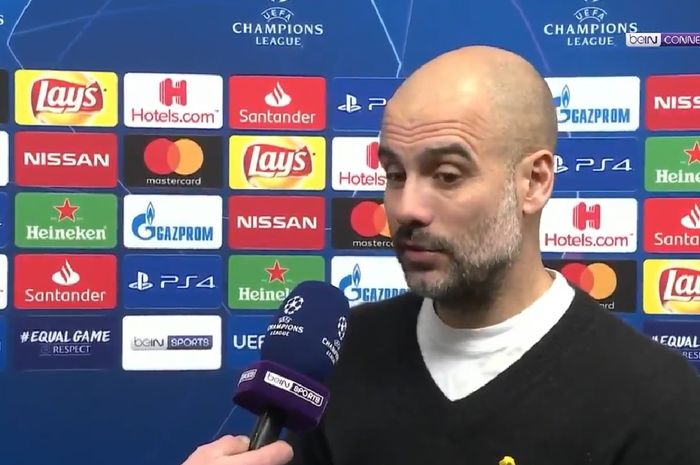 Pelatih Manchester City, Pep Guardiola, dalam wawancara singkat seusai leg I babak 16 besar Liga Champions antara Man City Vs Schalke 04 di Veltins Arena, Gelsenkirchen, 20 Februari 2019.