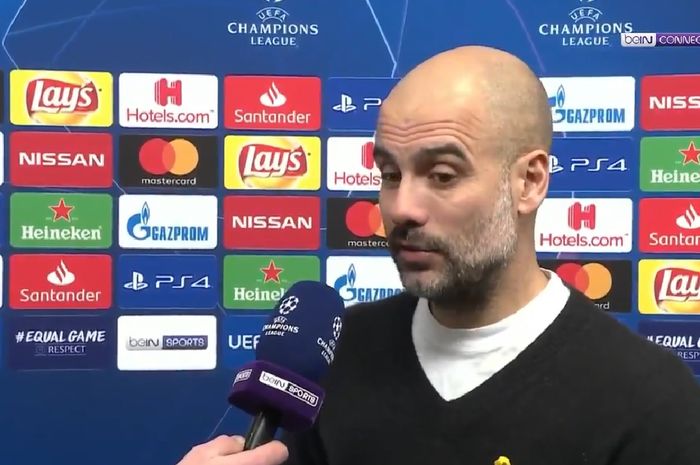 Pelatih Manchester City, Pep Guardiola, dalam wawancara singkat seusai leg I babak 16 besar Liga Champions antara Man City Vs Schalke 04 di Veltins Arena, Gelsenkirchen, 20 Februari 2019.