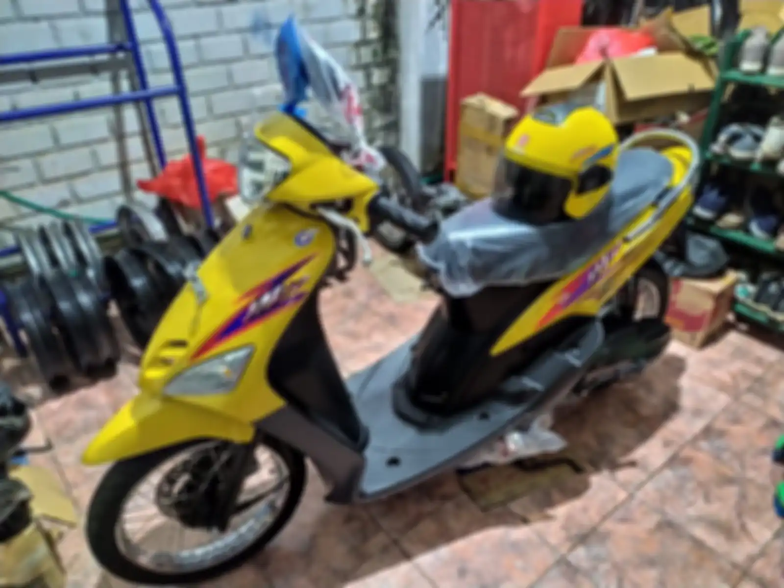 Yamaha Mio kuning milik Jimmy yang baru selesa direstorasi 